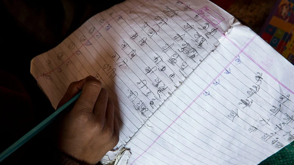 A child learning alphabets (photo: Getty Images)