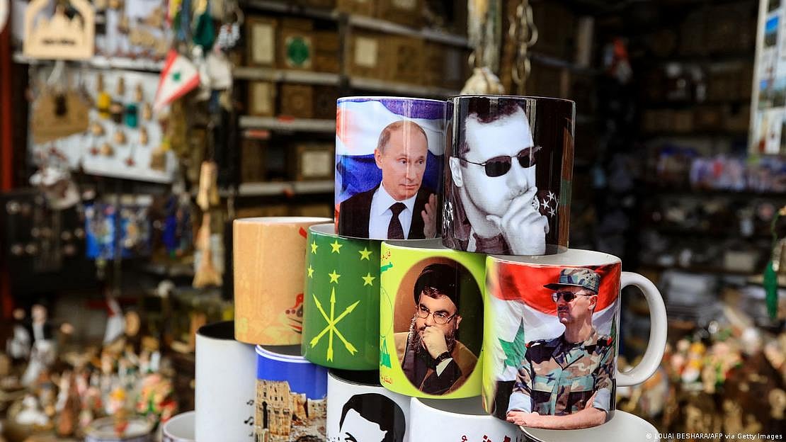 Hezbollah boss, Hassan Nasrallah, is depicted on a souvenir mug (central, in yellow) in a Syrian market (photo: LOUAI BESHARA/AFP via Getty Images via DW)