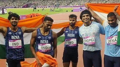 Neeraj Chopra (second from right) secures gold at Asian Games 2023, in Hangzhou, China (photo: IANS)