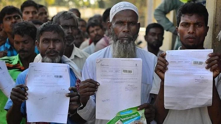 File photo of residents showing their documents during the NRC exercise in Assam in 2018 (photo: National Herald archives)