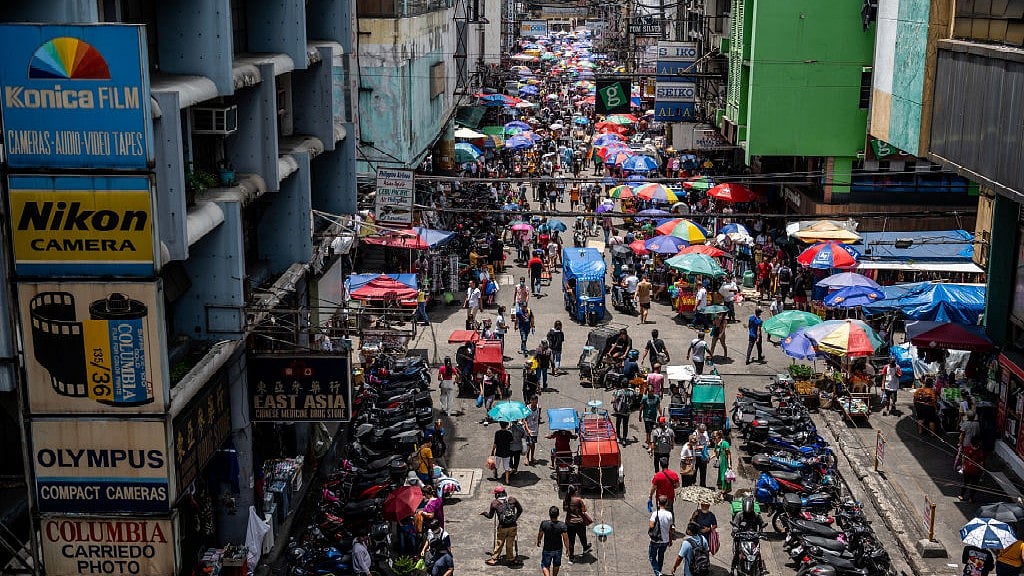 Shoppers at a market in Manila, the Philippines, on Friday, June 2, 2023 (Photographer: Lisa Marie David/Bloomberg via Getty Images)