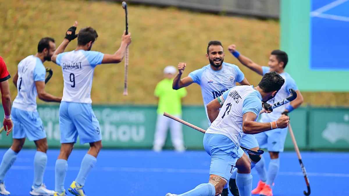 The Indian team celebrates after pumping in a goal during its 5-1 rout of Japan in the men's hockey final (photo: Hockey India) 