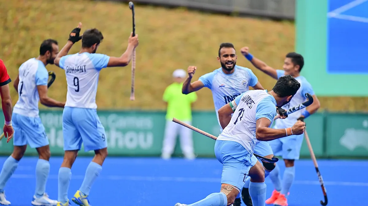 The Indian team celebrates after pumping in a goal during its 5-1 rout of Japan in the men's hockey final (photo: Hockey India)