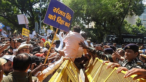 Sanjay Singh arrest: AAP workers try to break down police barricades