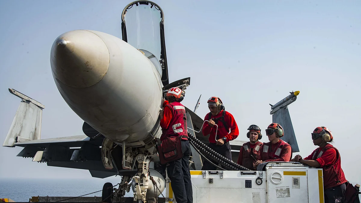 An F/A-18E Super Hornet on the flight deck of the aircraft carrier USS Dwight D. Eisenhower (photo courtesy: US Navy)