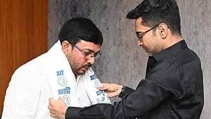 Harakali Protihar (left), MLA from Katulpur, switched to TMC in a ceremony attended by general secretary Abhishek Banerjee. (photo: IANS)