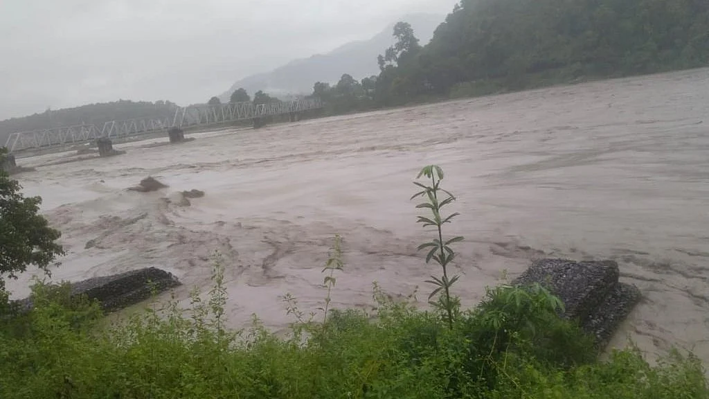 The river Teesta in spate in Sikkim, where a flash flood has caused more than 35 deaths thus far, with plenty of people still missing (photo: National Herald archives)