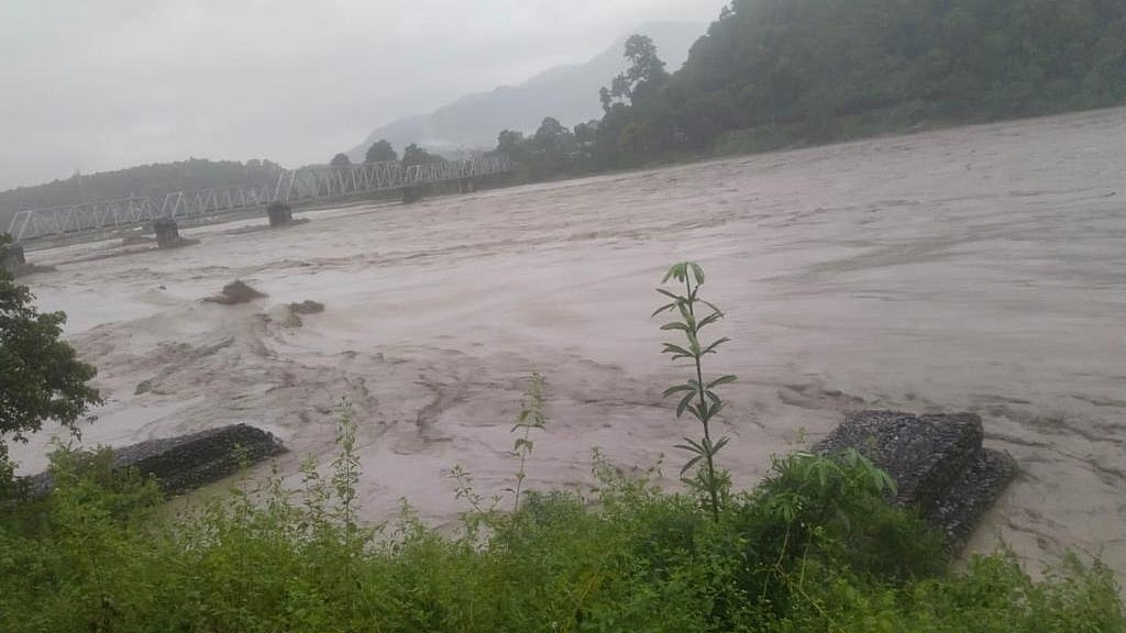 The river Teesta in spate in Sikkim, where a flash flood has caused more than 35 deaths thus far, with plenty of people still missing (photo: National Herald archives)