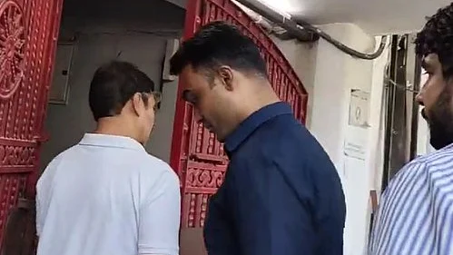 Newsclick office premises being sealed as by Special Cell officers of the Delhi Police, following its raids on Newsclick journalists and contributors (photo: IANS)