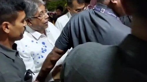 Maharashtra BJP minister Chandrakant Patil in his ink-stained shirt (photo: IANS)