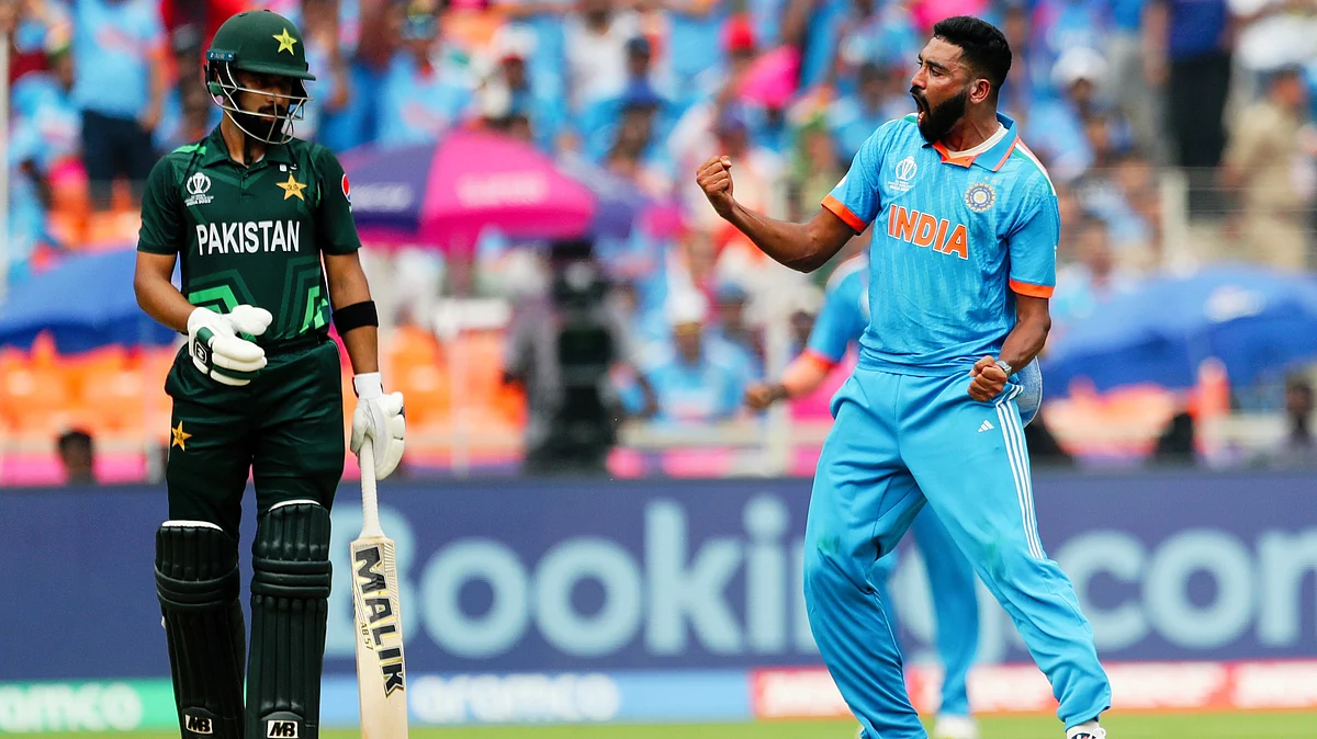 Mohammed Siraj celebrates the wicket of Pakistan's Abdullah Shafique during the India-Pakistan World Cup match in Ahmedabad on 14 October (photo: Getty Images)