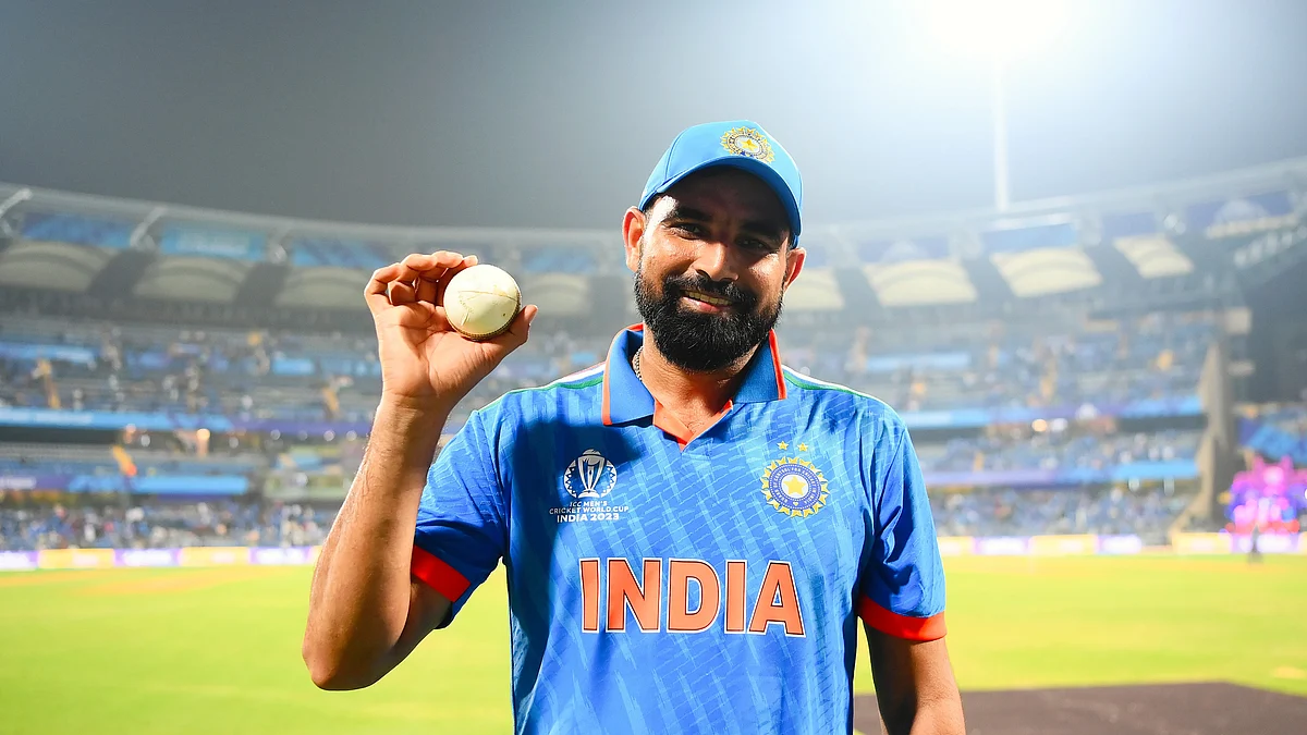 Mohammed Shami has a quiet moment with the ball after taking five wickets in the ICC Cricket World Cup match between India and Sri Lanka at Wankhede Stadium (photo: Getty Images)