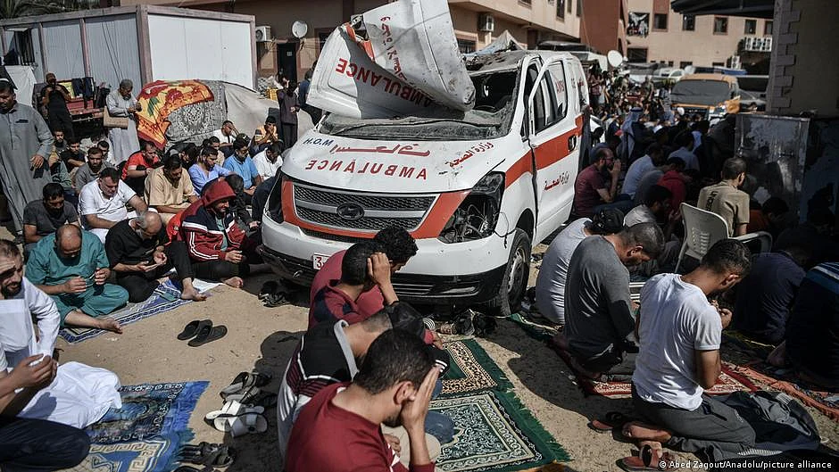 Palestinian people offering namaz near a hospital in Gaza amid continuing airstrikes by Israel 