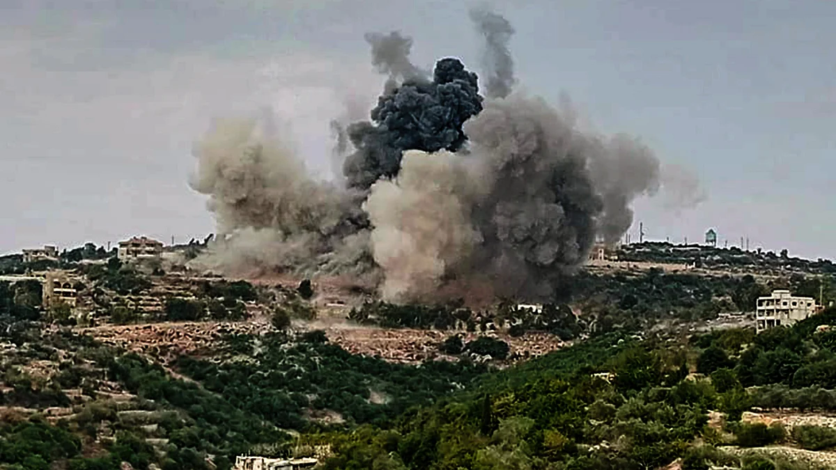 Thick smoke billows from an Israeli rocket attack on the outskirts of the Lebanese village of Dahira (photo: Getty Images)