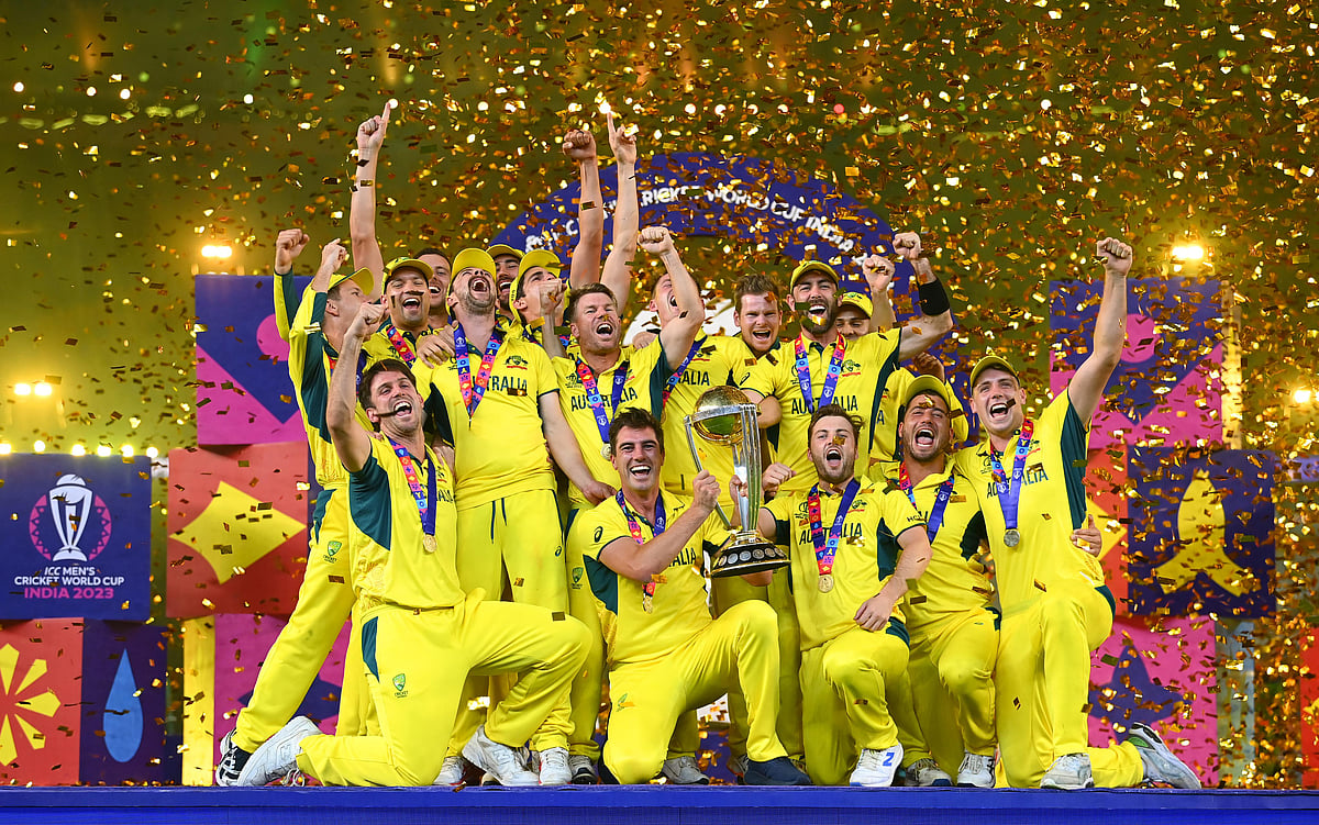 The victorius Australian team with their trophy (Photos courtesy: @ICC/ X)