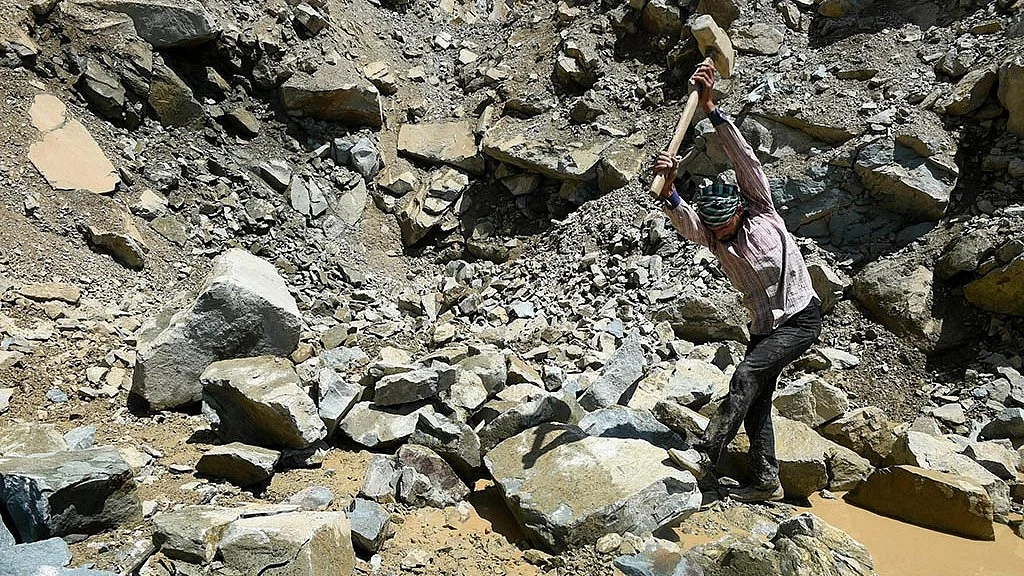 Representative image of a labourer working at a stone quarry (Photo: National Herald archives)