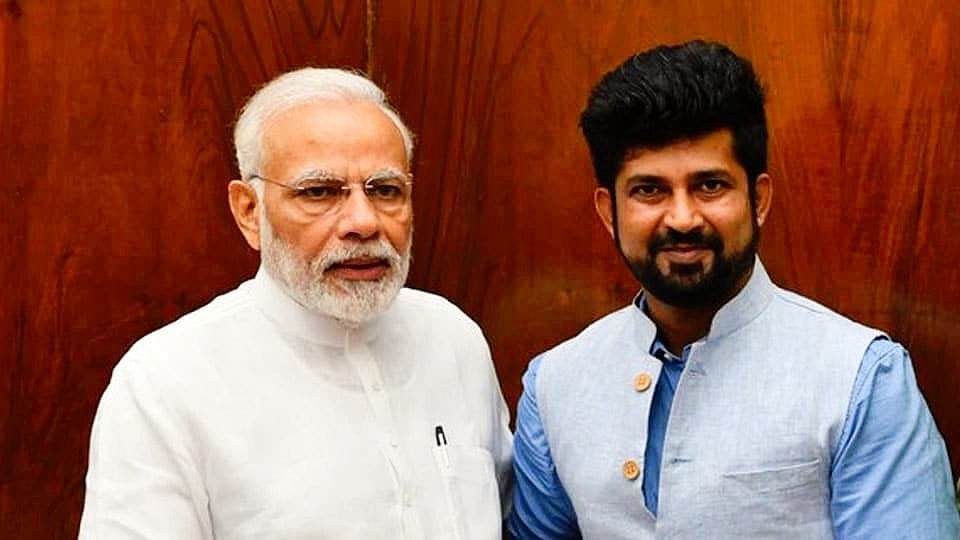Mysuru-Kodagu MP Pratap Simha (right) with Prime Minister Narendra Modi (photo: @mepratap/X)