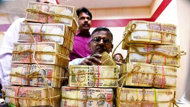 File photo of demonetised Rs 500 and Rs 1,000 notes