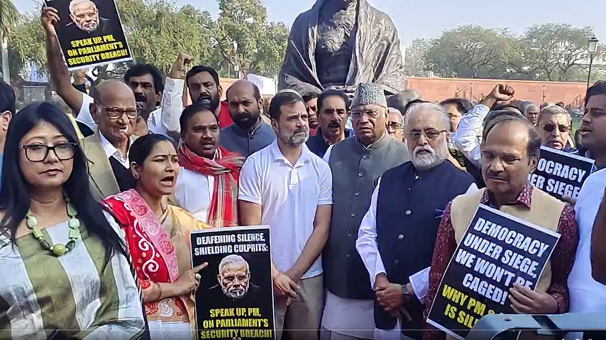 Opposition leaders hold a demonstration by the Gandhi statue outside the new parliament building in New Delhi on 19 December 2023 (screengrab from video courtesy @kharge/X)