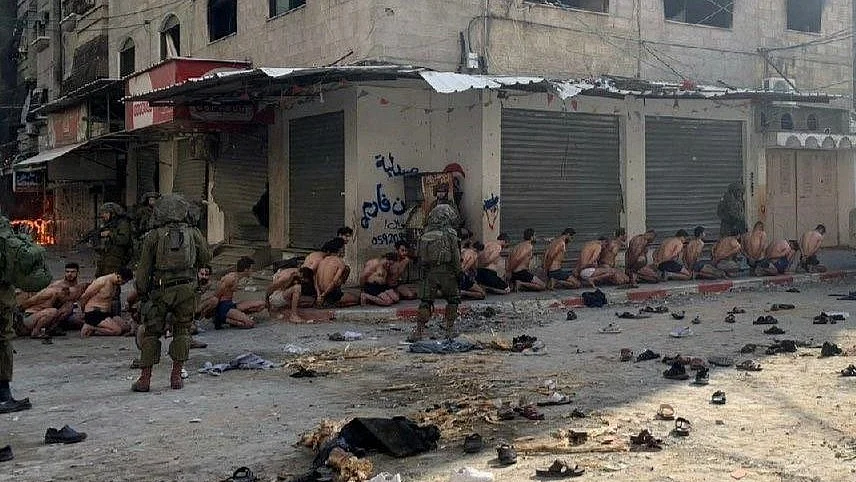 In Beit Lahia, Gaza, on 8 December 2023, a number of Palestinian males were 'arrested' from a UN school, held overnight outdoors, stripped to their underwear, by Israel Defense Forces (IDF) (photo courtesy @DALLOULALNEDER/Twitter)
