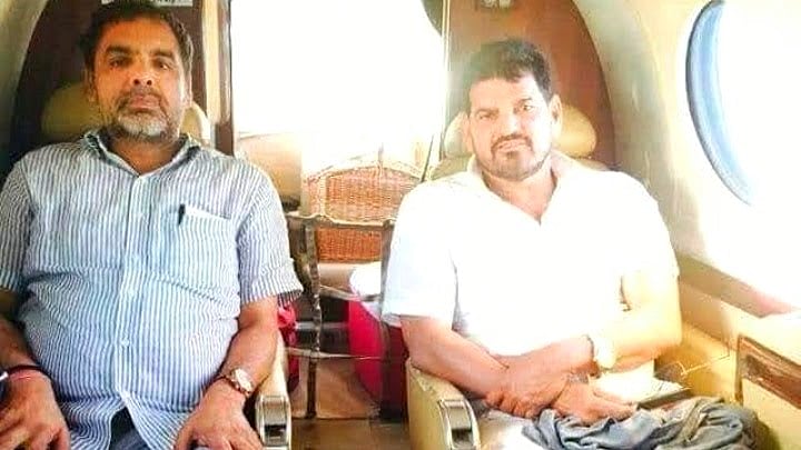 Sanjay Singh (left) with mentor Brij Bhushan Sharan Singh (photo: @SakshiMalik/X)