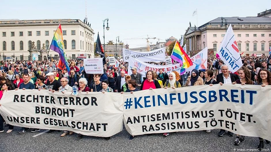 File photo of a march against anti-Semitism in Berlin. The banners read: 'Right-wing terror threatens our society' and 'anti-Semitism kills. Racism kills.'