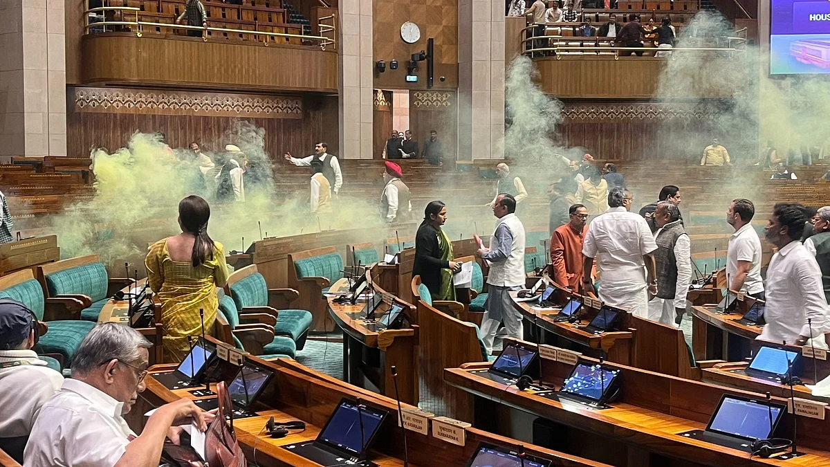 Two intruders unleashed foul smelling yellow coloured gas from canisters inside Parliament gallery on 13 December (photo: @nitinagarwalINC/X)