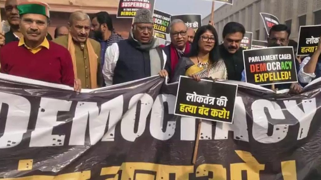 Opposition protests mass suspension of MPs, Kharge asks govt to "behave democratically"