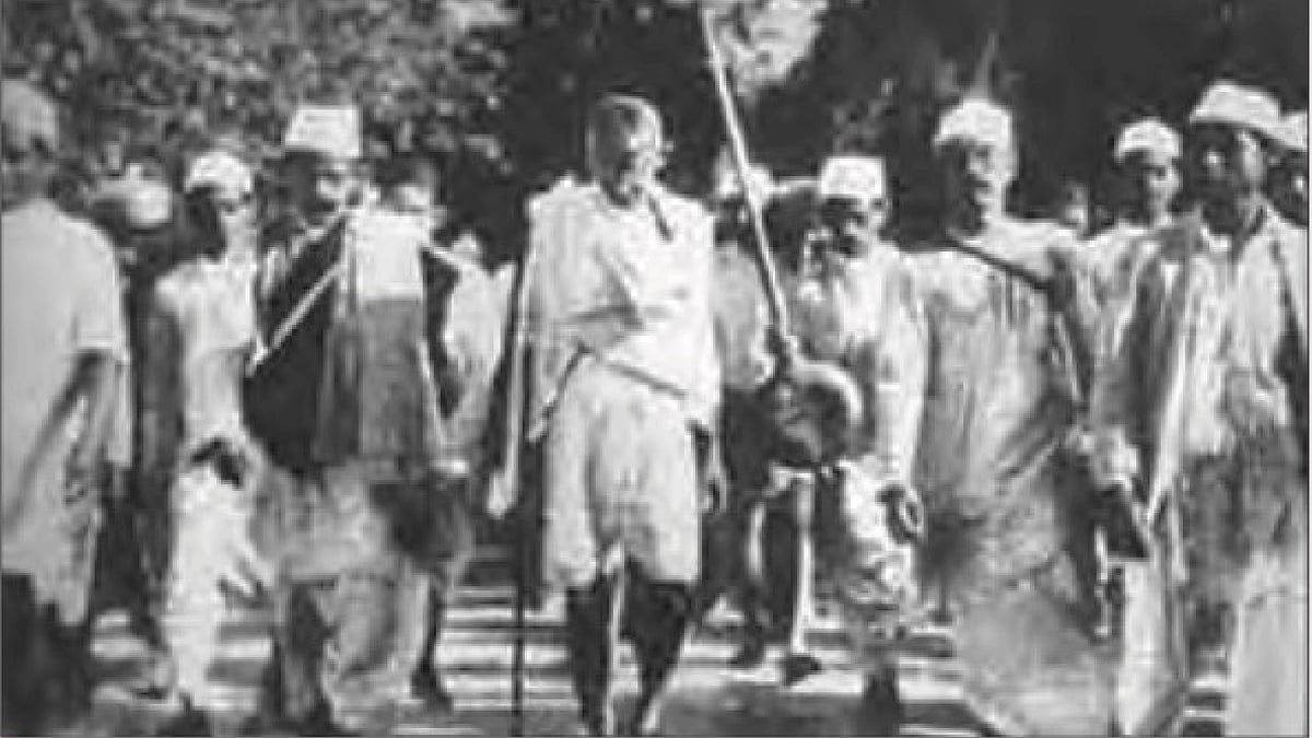 1919: Gandhi (centre) walks with followers in protest against the Rowlatt Act (photo: National Herald archives)
