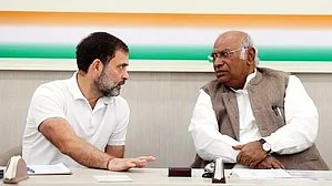 Rahul Gandhi (left) has pitched in for the Donate for Desh campaign launched by Mallikarjun Kharge (photo: IANS)