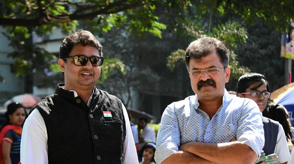 Jitendra Awhad (right) with NCP leader Manoj Pradhan (photo: @Awhadspeaks/X)