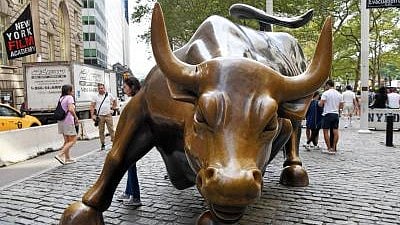 Asian shares mixed, tracking Wall Street split as momentum slows, Tesla drops