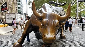 Asian shares mixed, tracking Wall Street split as momentum slows, Tesla drops