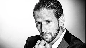 Christian Oliver (pictured) most recently appeared in last year’s ‘Indiana Jones and the Dial of Destiny’ and played the racecar driver Snake Oiler in ‘Speed Racer’ (screengrab from imdb.com)
