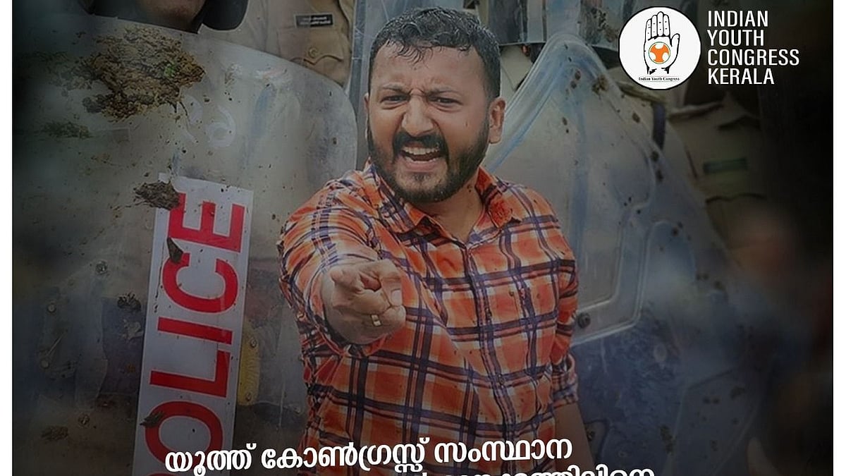 An Indian Youth Congress Kerala poster featuring president Rahul Mamkootathil, speaking belligerently and pointing forwards against a backdrop of police shields (photo courtesy @IYC/X) 