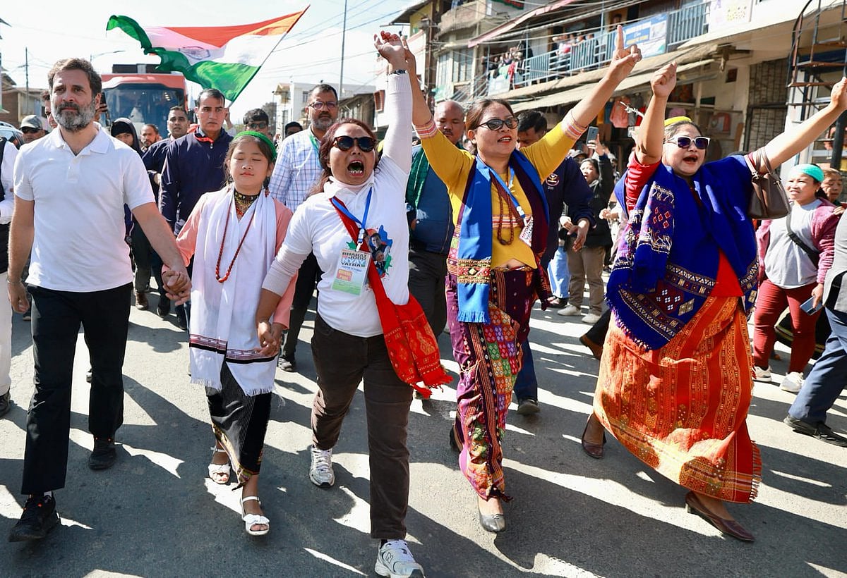 Rahul Gandhi was seen walking hand in hand with local supporters today as the Bharat Jod Nyay Yatra came to Senapati for its next key public gathering on Day 2 (photo courtesy @INCIndia/X)