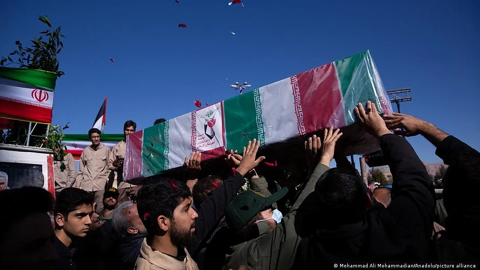 Mourners in Kerman, Iran, carry the coffin of one of the civilians killed in the terror attack on 3 January 2023. Reports said 30 of the victims were children, and nine were 10 years old or younger (photo: DW)  