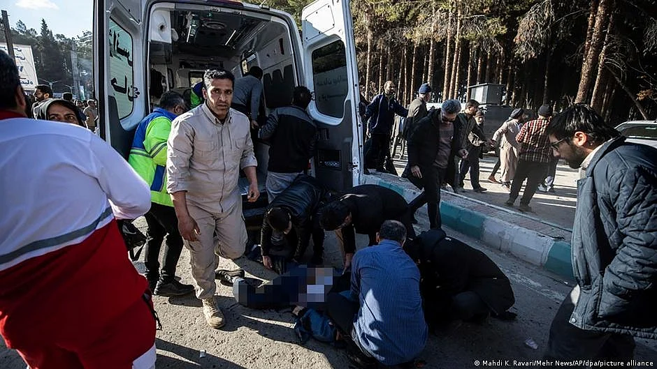 Medics at work by an ambulance near the cemetery where slain general Qassem Soleimani was laid to rest, where hundreds gathered to commemorate the anniversary of his death in an US strike in 2020 (photo: DW)