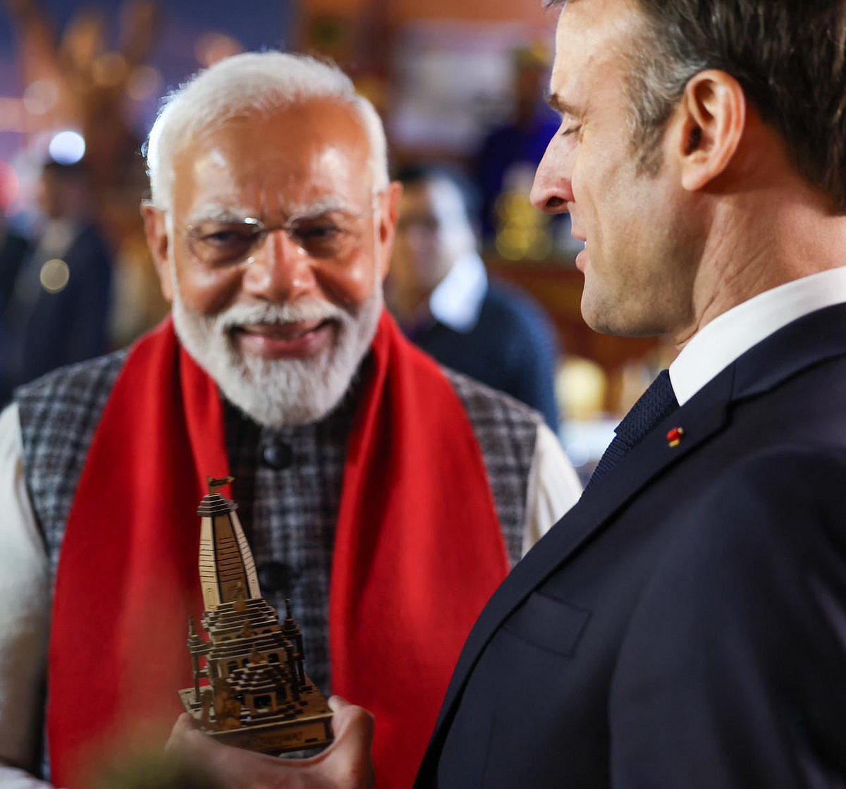 Prime Minister Modi hands President Macron of France a small gift: a miniature replica of the recently inaugurated Ram Mandir in Ayodhya (photo courtesy @VanathiBJP/X)