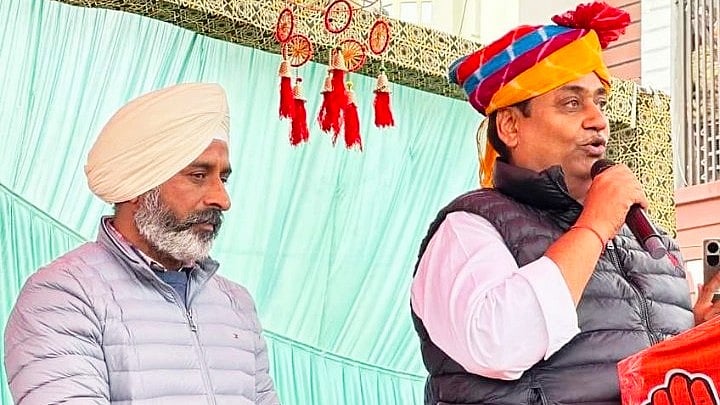 Rajasthan Congress chief Govind Dotasra (right) campaigning for Rupinder Singh Kunnar