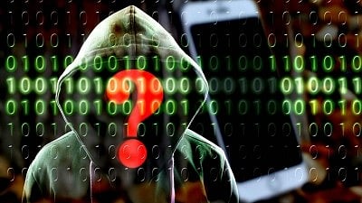 Representative image of binary code overlaid on a dark hooded figure with a question mark over their face (photo: IANS)
