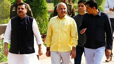 Sanjay Singh (left) and Manish Sisodia (centre)