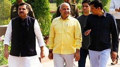 Sanjay Singh (left) and Manish Sisodia (centre)
