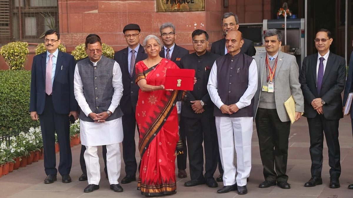 Finance minister Nirmala Sitharaman (centre, in red saree) with her team at the ministry of finance ahead of the Budget presentation on 1 February 2024 (photo: Vipin Kumar)