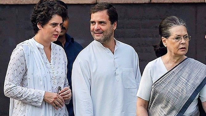 File photo of (from left) Priyanka and Rahul with Sonia Gandhi