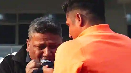 Sarfaraz Khan's father Naushad breaks down as his son shows him the India cap (photo: bcci.tv)
