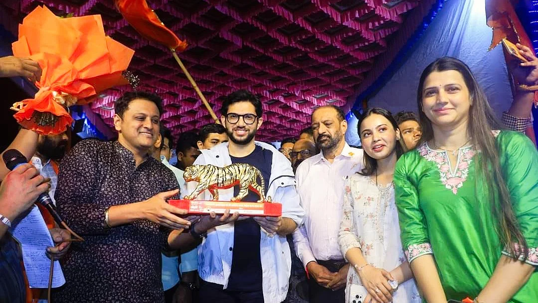 (From left) Abhishek Ghosalkar with Shiv Sena (UBT) leader Aaditya Thackeray and Vinod Ghosalkar (photo: @a_vghosalkar/X)