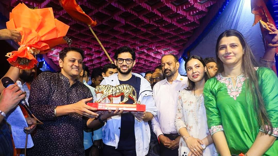 (From left) Abhishek Ghosalkar with Shiv Sena (UBT) leader Aaditya Thackeray and Vinod Ghosalkar (photo: @a_vghosalkar/X)