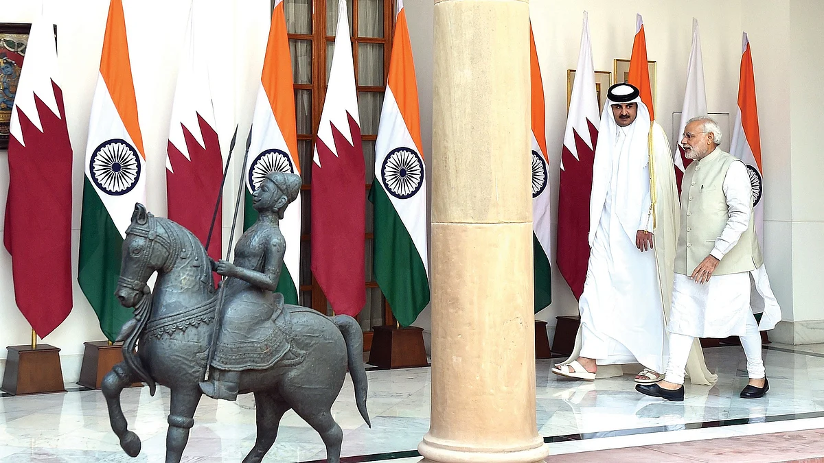 Prime Minister Narendra Modi (right) with the Emir of Qatar, Sheikh Tamim Bin Hamad Al-Thani (photo: Prakash Singh/Getty Images)
