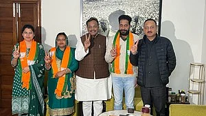 Chandigarh Mayor Manoj Sonkar (pictured) is seen here with BJP national general secretary Vinod Tawde after joining the BJP along with two other councillors (photo: IANS)